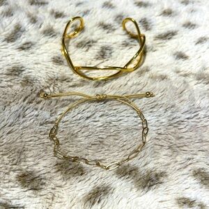 Two adjustable gold bracelets